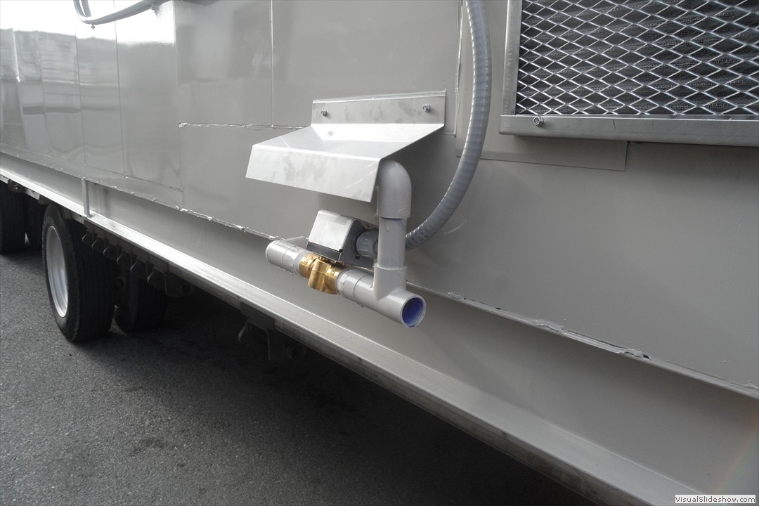 Water intake and dump valves are all covered by a small hood for protection from the outside environment.